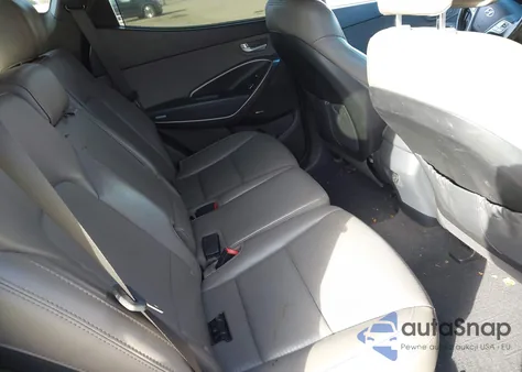 2014 Hyundai Santa Fe Sport 2.4L z USA, uszkodzony, nr VIN 5XYZUDLB7EG209088